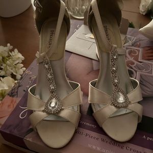 Beautiful shoes worn for a few hours for wedding.  In perfect condition.